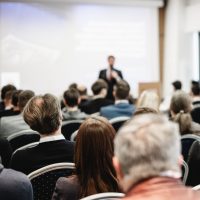 scientific conference presentation to a large group